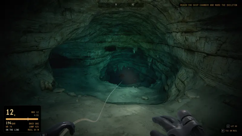 A deep chamber with the line leading into the dark